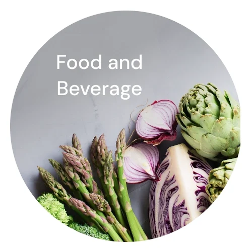 Assortment of vegetables with text "Food and Beverage" overlaying it.